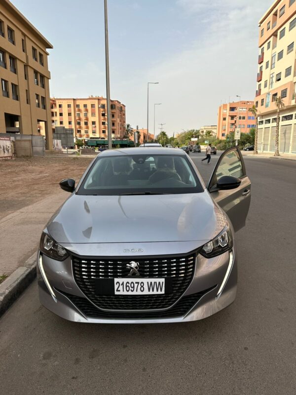 a silver car parked on a street